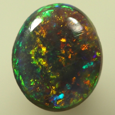 SOLID SEMI BLACK OPAL Pinfire pattern. Sparkling bright fire.